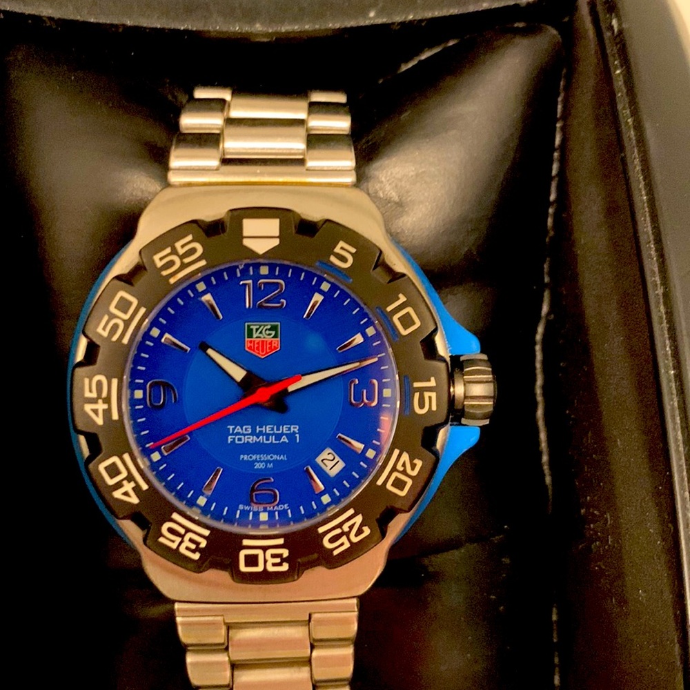 Tag heuer formula 1 blue face watch. I am original owner with box and books.